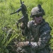 Marines with Company F fire and maneuver in Japan's hills