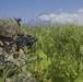 Marines with Company F fire and maneuver in Japan's hills