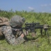 Marines with Company F fire and maneuver in Japan's hills