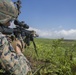 Marines with Company F fire and maneuver in Japan's hills