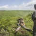 Marines with Company F fire and maneuver in Japan's hills