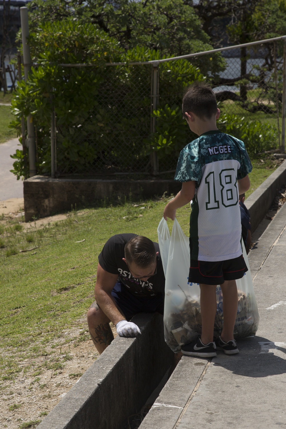 USFJ – American Football League cleans up Sunset beach seawall