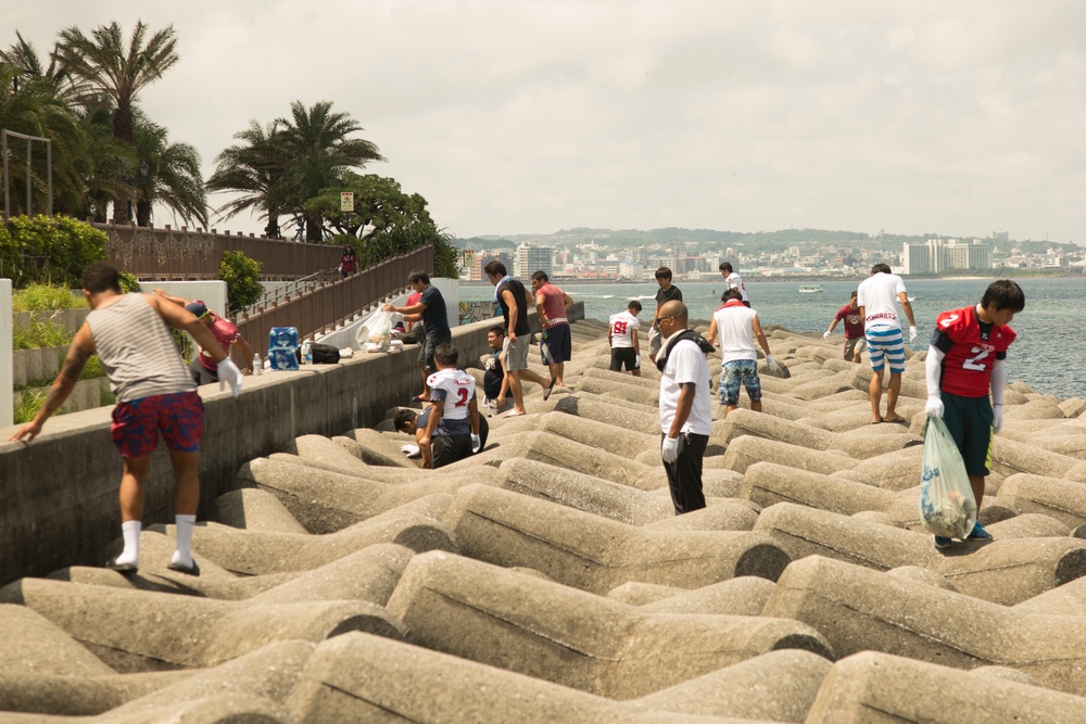 USFJ – American Football League cleans up Sunset beach seawall