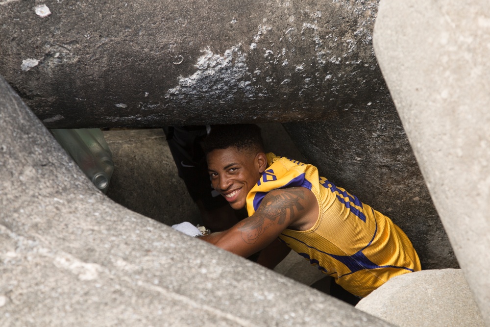 USFJ – American Football League cleans up Sunset beach seawall