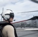 Naval Air Crewman Prepares To Board