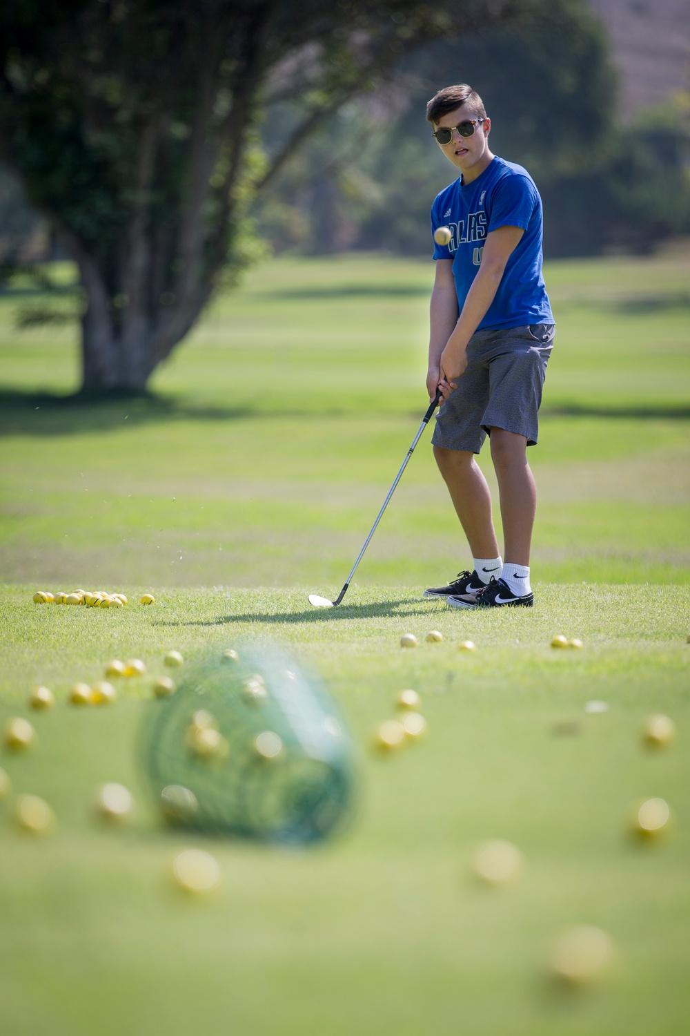 FOUR! Camp Pendleton kids hit the green during MCCS golf clinic
