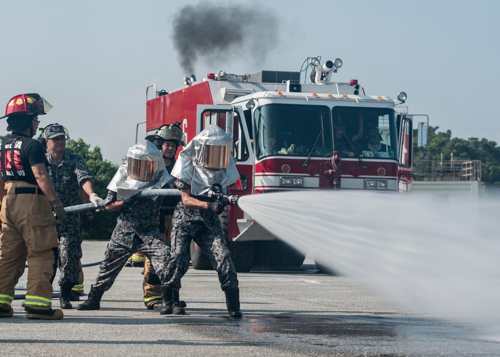 This plane is on fire: 18 CES and Naha AB firefighters conduct joint live-fire training