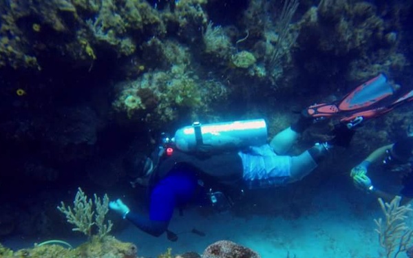 Joint Task Force Troopers assist wounded warriors with scuba dive