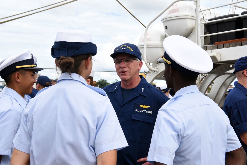 Rear Admiral Todd Sokalzuk, Atlantic Area Deputy Commander, speaks with cadets aboard the Coast Guard Cutter Barque Eagle