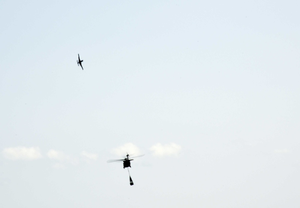 UH-60 Black Hawk helicopters practice sling-loading equipment exercise Northern Strike 18