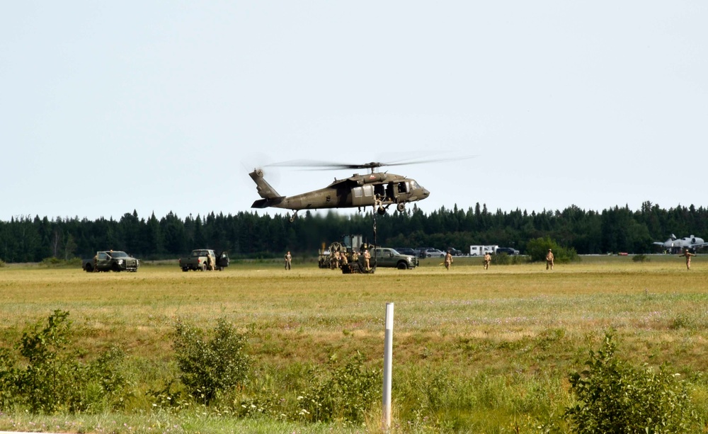 UH-60 Black Hawk helicopters practice sling-loading at Northern Strike 18