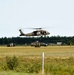 UH-60 Black Hawk helicopters practice sling-loading at Northern Strike 18