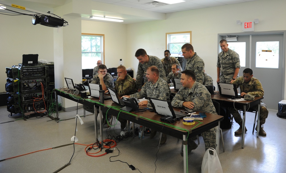 Cyber Mission Defense Teams from Air Force and Army operate together during Exercise Patriot Warrior