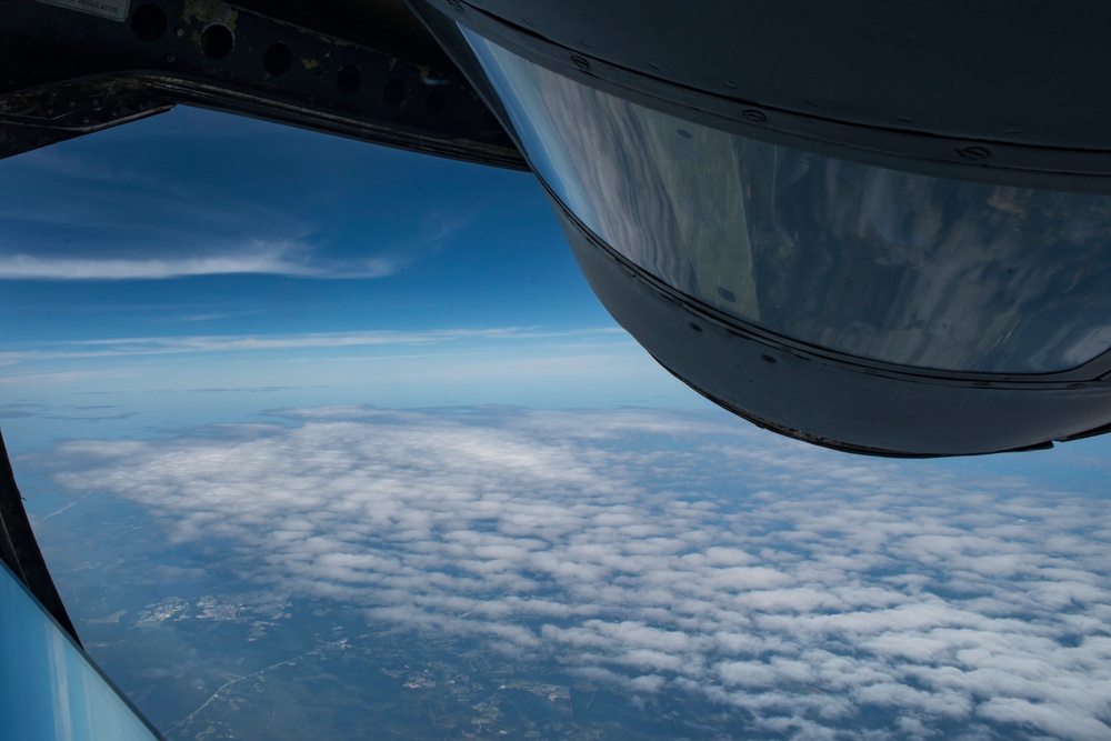 121st ARW KC-135 Stratotanker refuels Semour Johnson AFB F-15E Strike Eagles