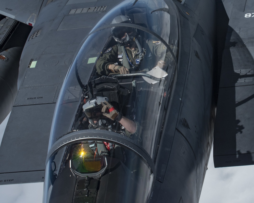 121st ARW KC-135 Stratotanker refuels Semour Johnson AFB F-15E Strike Eagles