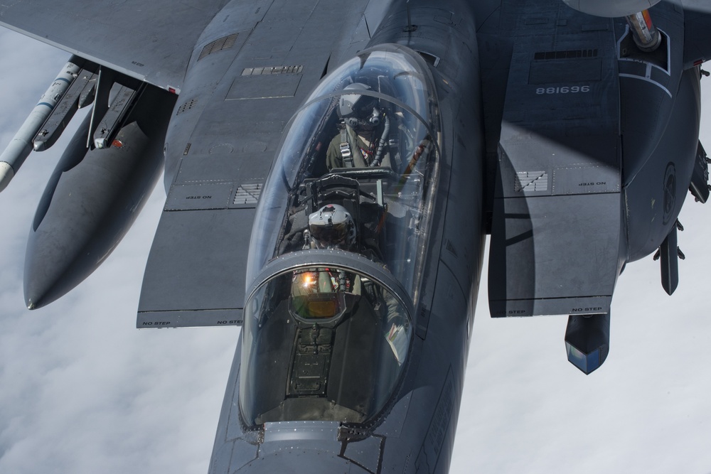 121st ARW KC-135 Stratotanker refuels Semour Johnson AFB F-15E Strike Eagles