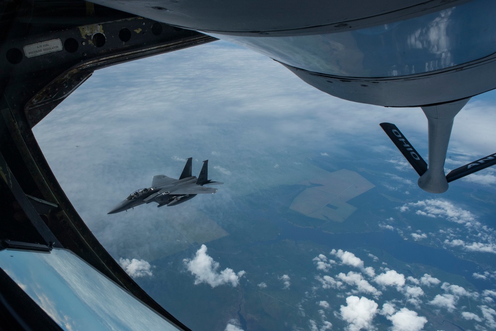 121st ARW KC-135 Stratotanker refuels Semour Johnson AFB F-15E Strike Eagles