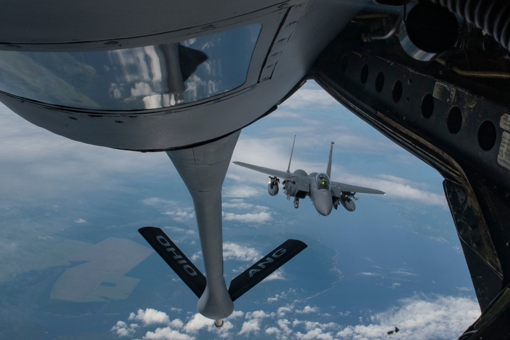 121st ARW KC-135 Stratotanker refuels Semour Johnson AFB F-15E Strike Eagles