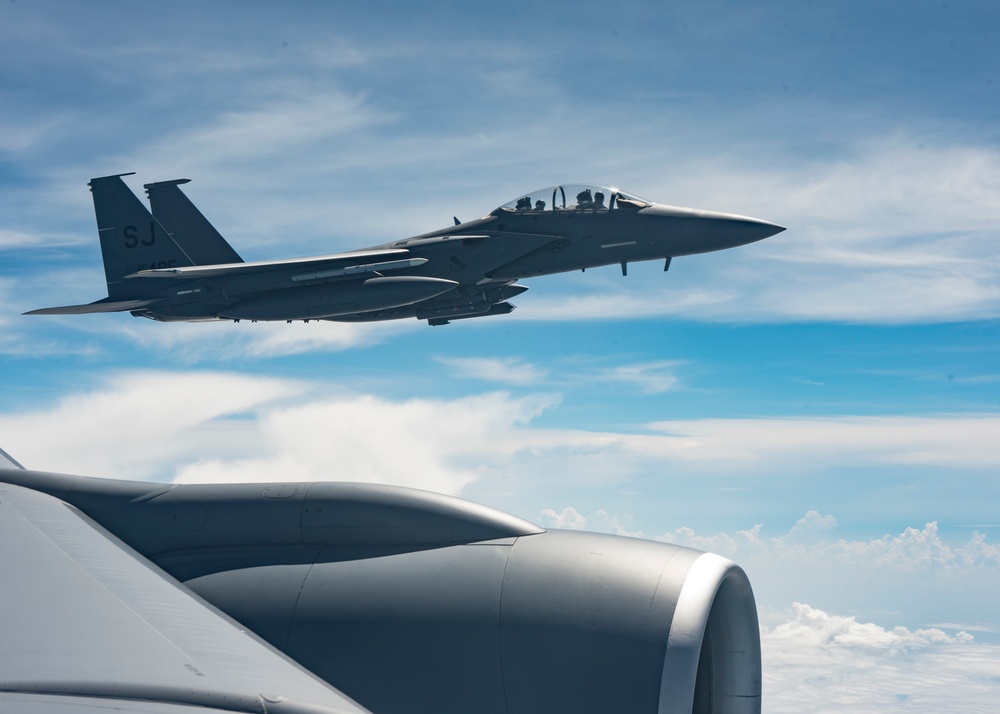 121st ARW KC-135 Stratotanker refuels Semour Johnson AFB F-15E Strike Eagles