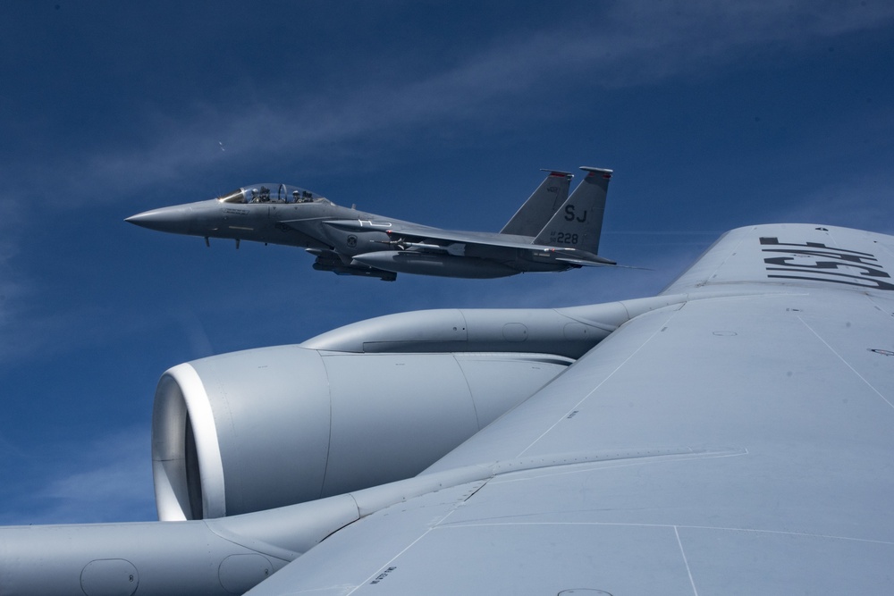 121st ARW KC-135 Stratotanker refuels Semour Johnson AFB F-15E Strike Eagles