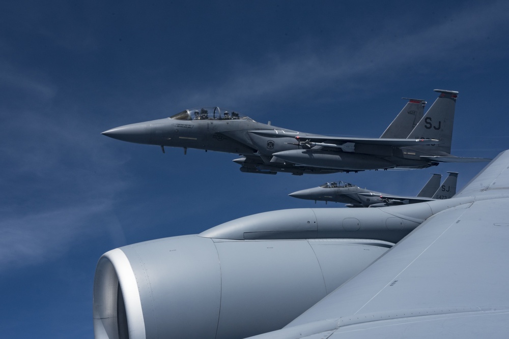 121st ARW KC-135 Stratotanker refuels Semour Johnson AFB F-15E Strike Eagles