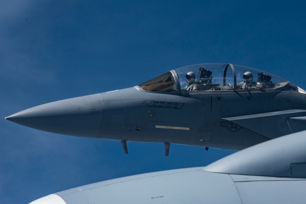 121st ARW KC-135 Stratotanker refuels Semour Johnson AFB F-15E Strike Eagles