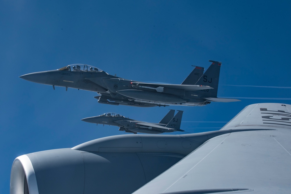 121st ARW KC-135 Stratotanker refuels Semour Johnson AFB F-15E Strike Eagles