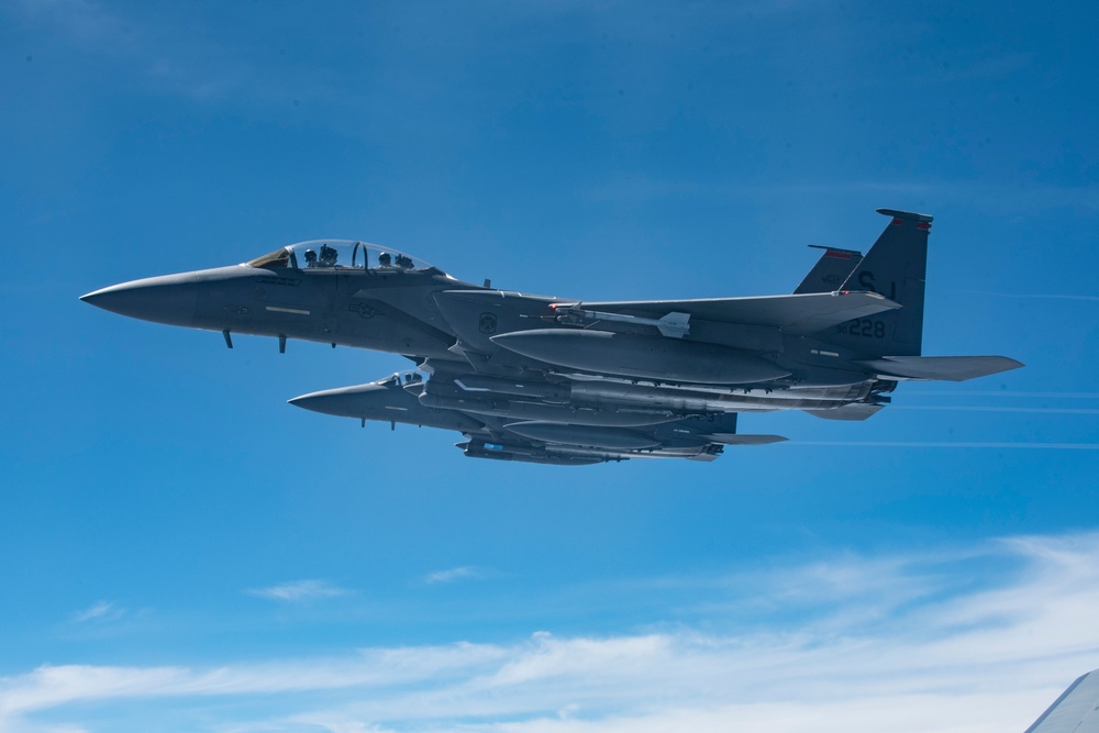 121st ARW KC-135 Stratotanker refuels Semour Johnson AFB F-15E Strike Eagles