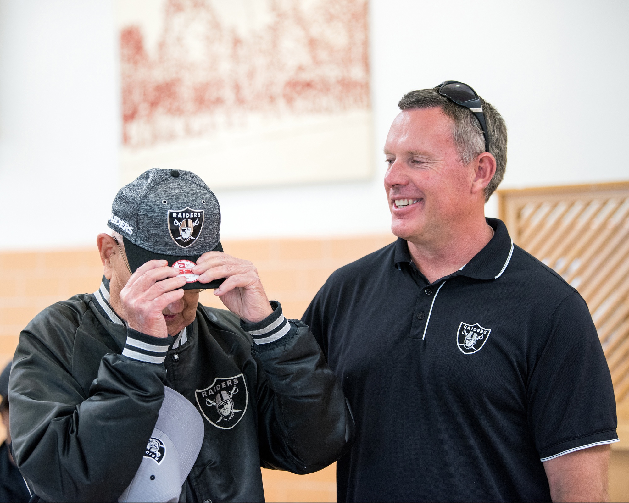 From left, Raiders Alumni Vance Mueller, U.S. Air Force Veteran