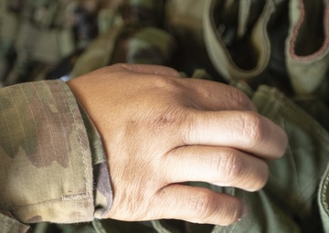 U.S. Army Reserve Soldiers check out MILES gear.
