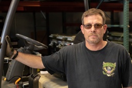 U.S. Army Reserve Soldiers check out MILES gear.