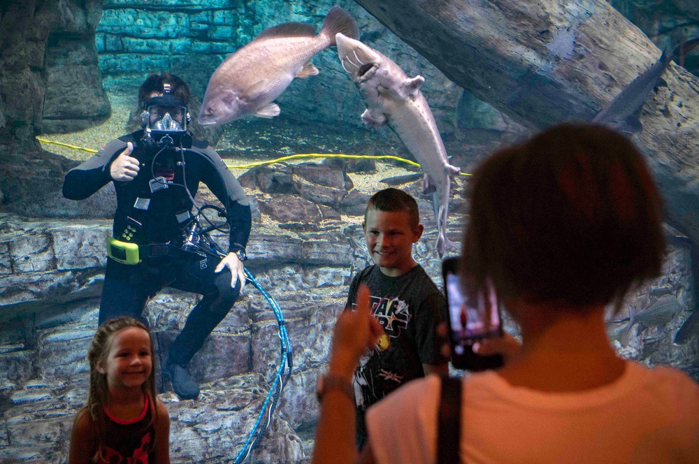 Navy Divers Plunge into Discovery Center Science and Technology Center