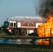 Firefighters extinguish simulated aircraft burn
