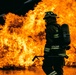 Firefighters extinguish simulated aircraft burn