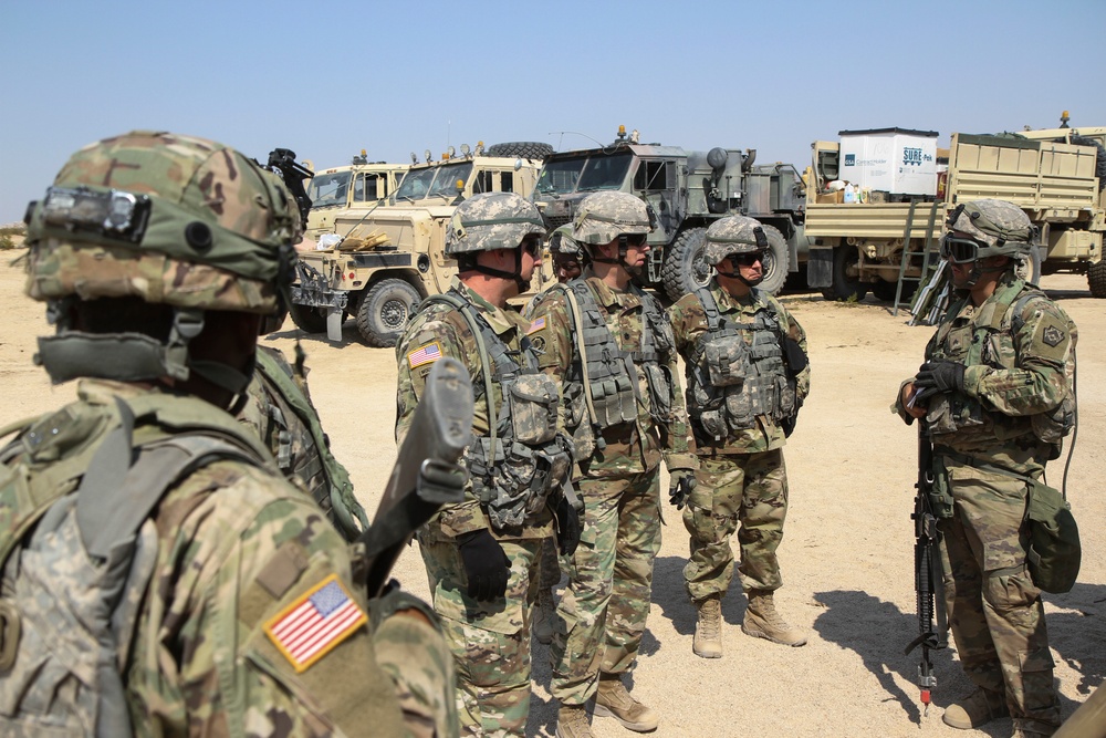 213th RSG command group circulates the NTC battlefield