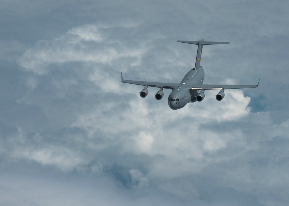 KC-135 Stratotankers with the 121st ARW refuel C-17 Globemaster IIIs with the 437th AW