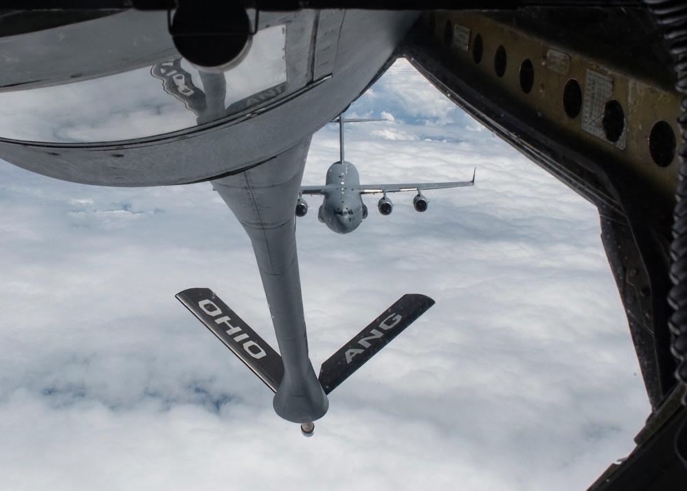 KC-135 Stratotankers with the 121st ARW refuel C-17 Globemaster IIIs with the 437th AW