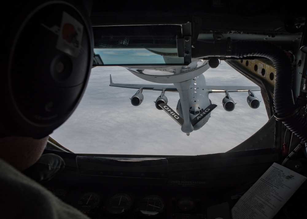 KC-135 Stratotankers with the 121st ARW refuel C-17 Globemaster IIIs with the 437th AW