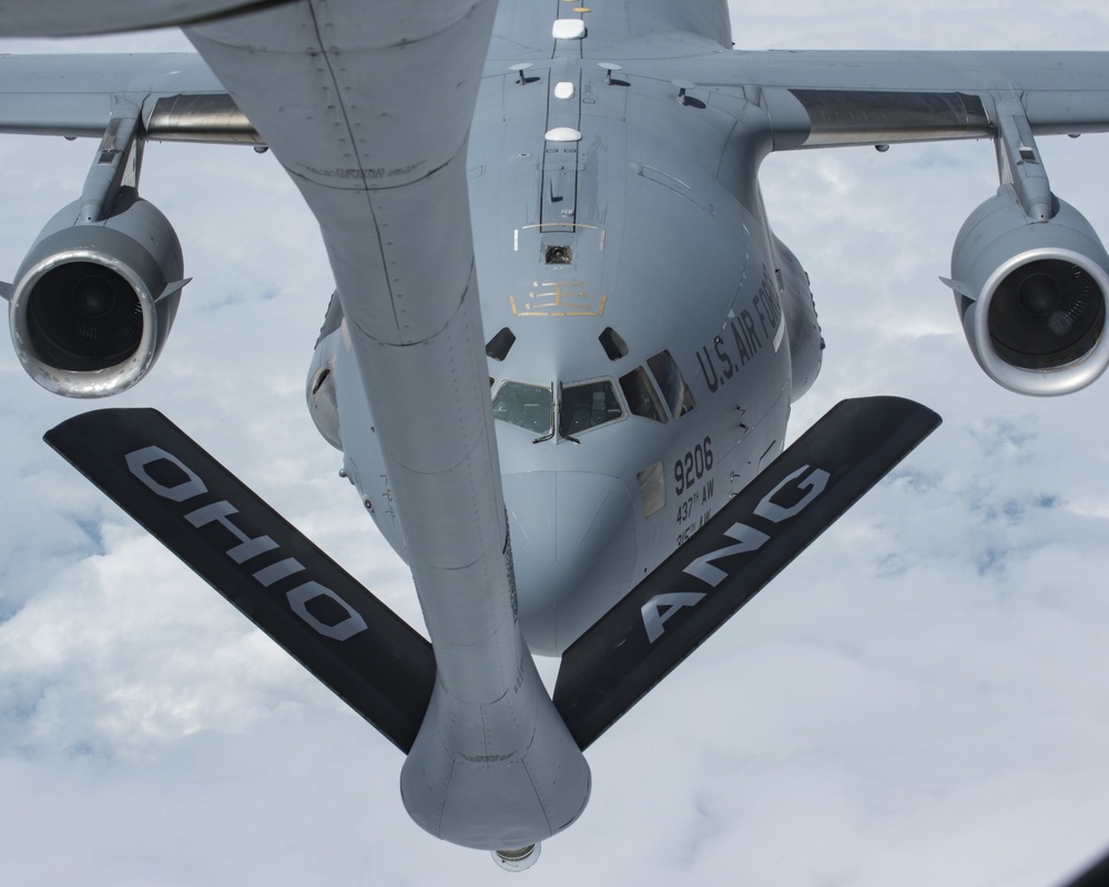 KC-135 Stratotankers with the 121st ARW refuel C-17 Globemaster IIIs with the 437th AW