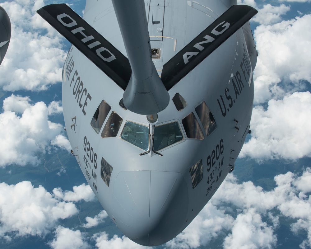 KC-135 Stratotankers with the 121st ARW refuel C-17 Globemaster IIIs with the 437th AW