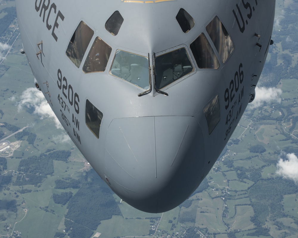 KC-135 Stratotankers with the 121st ARW refuel C-17 Globemaster IIIs with the 437th AW