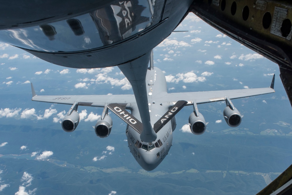 KC-135 Stratotankers with the 121st ARW refuel C-17 Globemaster IIIs with the 437th AW