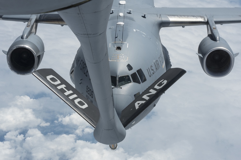 KC-135 Stratotankers with the 121st ARW refuel C-17 Globemaster IIIs with the 437th AW