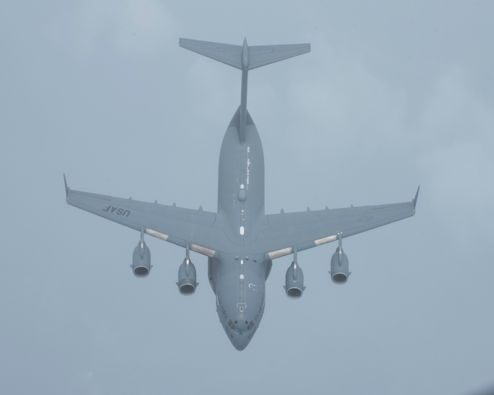 KC-135 Stratotankers with the 121st ARW refuel C-17 Globemaster IIIs with the 437th AW