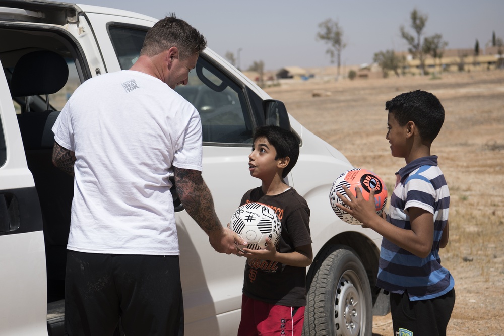 Airman collects donations, renovates soccer field for local kids