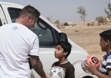 Airman collects donations, renovates soccer field for local kids