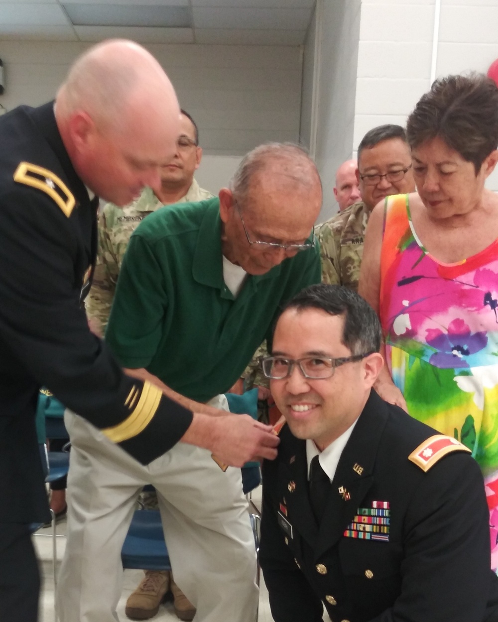 Col. Iseri promoted by parents and commanding general