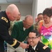 Col. Iseri promoted by parents and commanding general