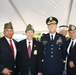 Brig. Gen. Tickner stands with veterans following memorial stone dedication