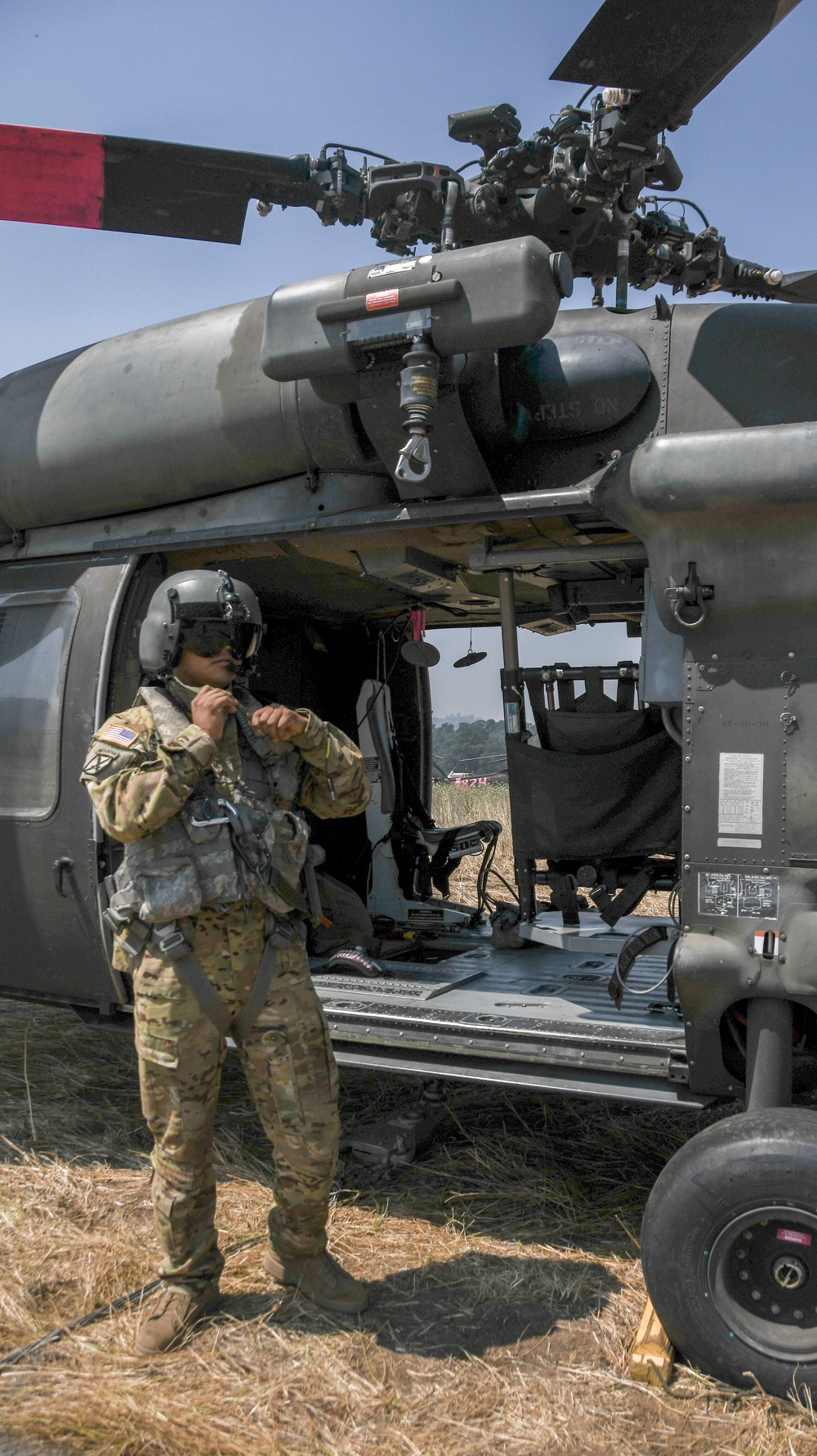 Crew chief dons gear [Image 4 of 5]